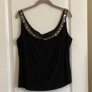 Black, two piece jacket and tank top.